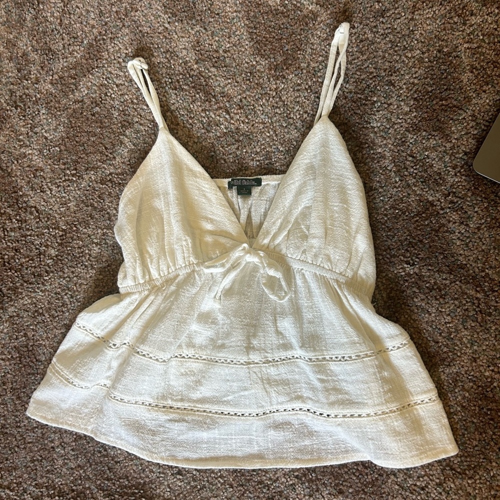 white tie-front top with adjustable straps